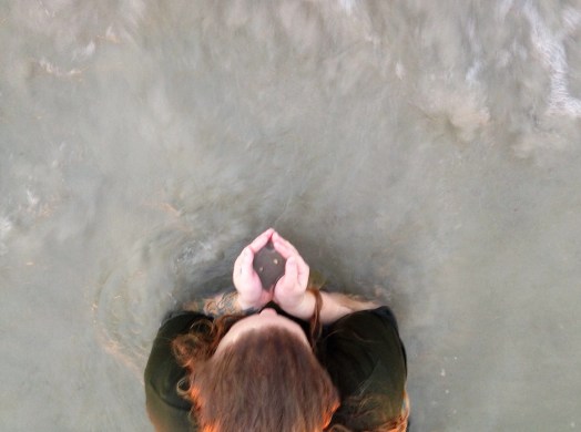Ayla holding clams in her hands (2)